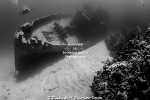 The USS Kittiwake has been rolled into the reef by in Hur... by Susannah H. Snowden-Smith 
